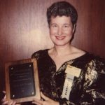 Julie Virgo receiving Watson Davis Award