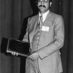 Roy D. Tally receiving Watson Davis Award