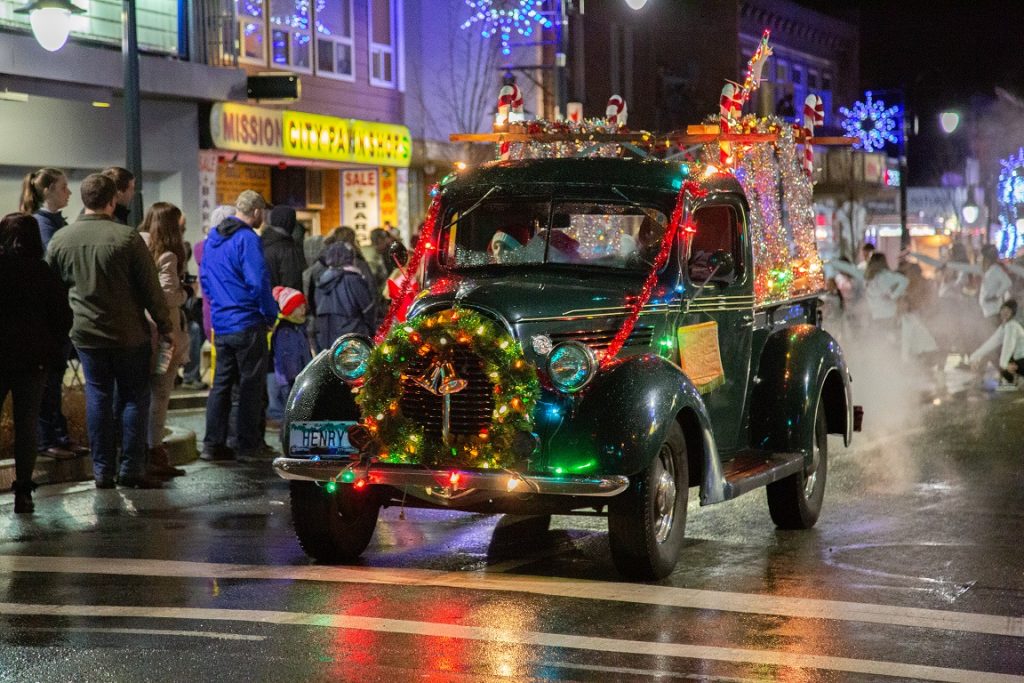 old car with christmas decorations at Mission's Candlelight Parade