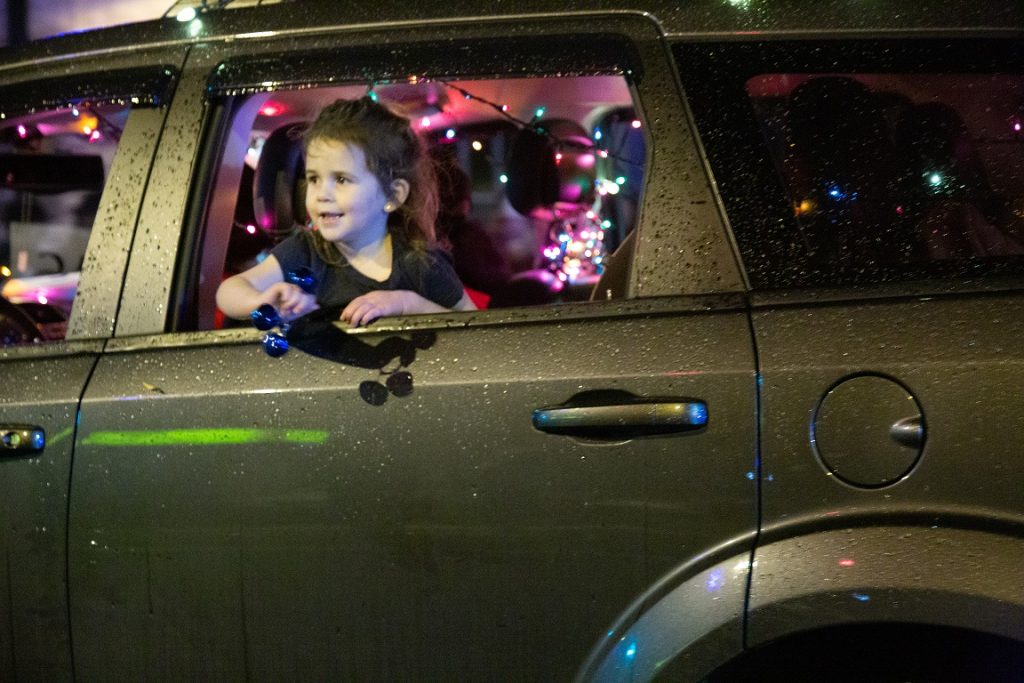 child in truck at Mission's Candlelight Parade
