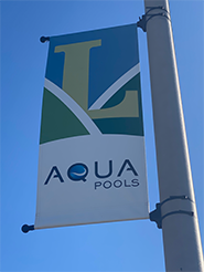 Lemont Lightpole featuring Aqua Pools Logo